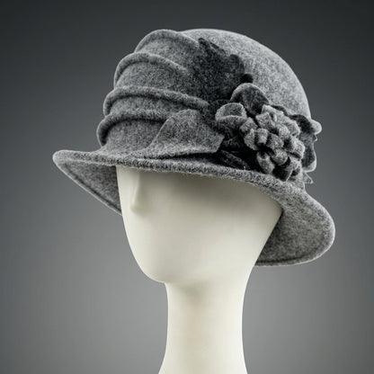 Light gray wool felt cloche hat with a layered gray floral decoration