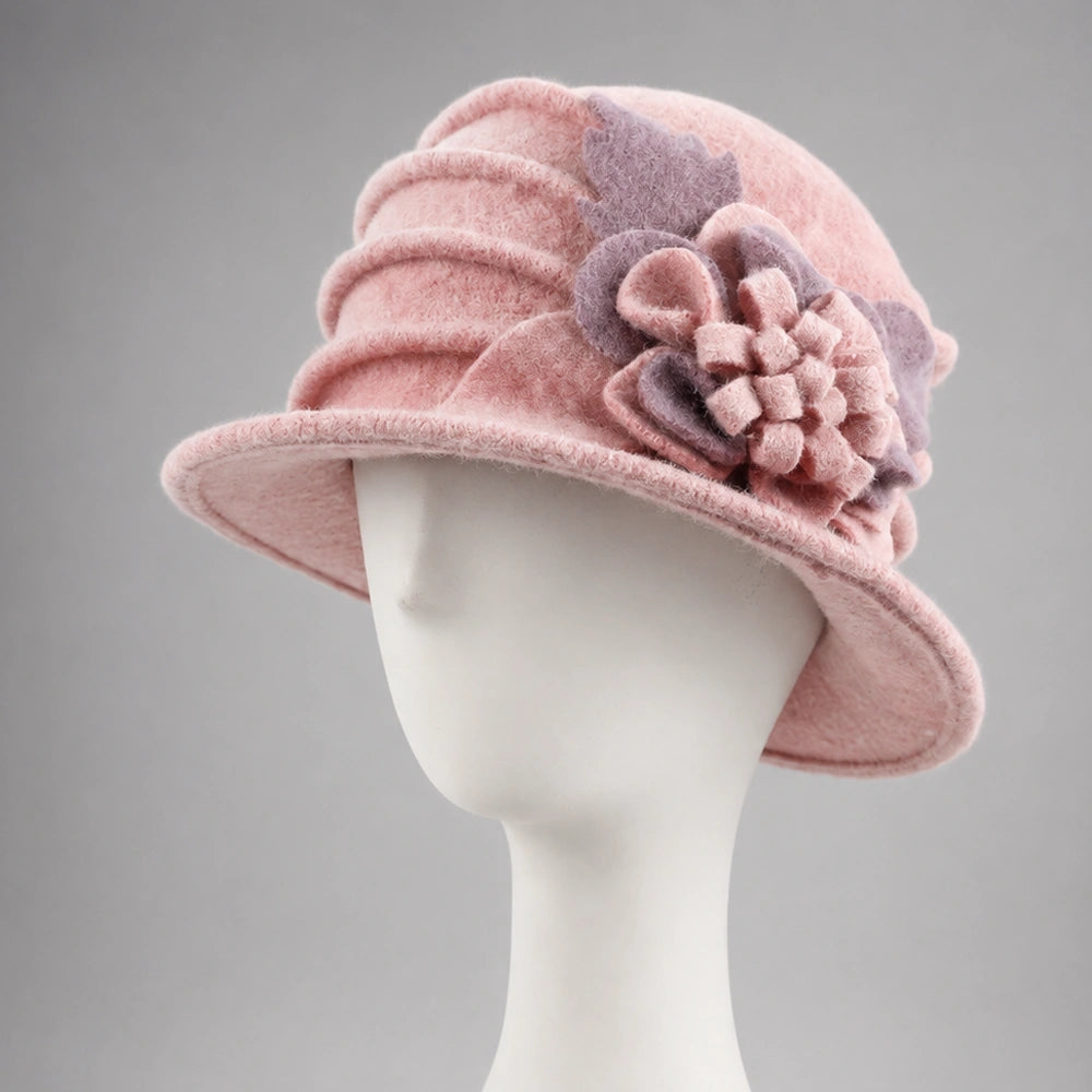 Light pink wool felt cloche hat with a layered pink and lavender flower