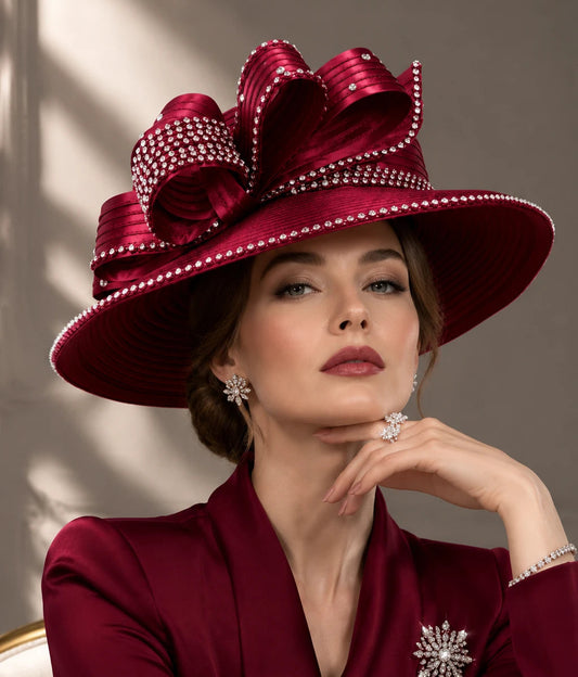 Elegant maroon church hat with rhinestone trims and decorative loops, perfect for formal Sunday service, weddings, or derby fashion.