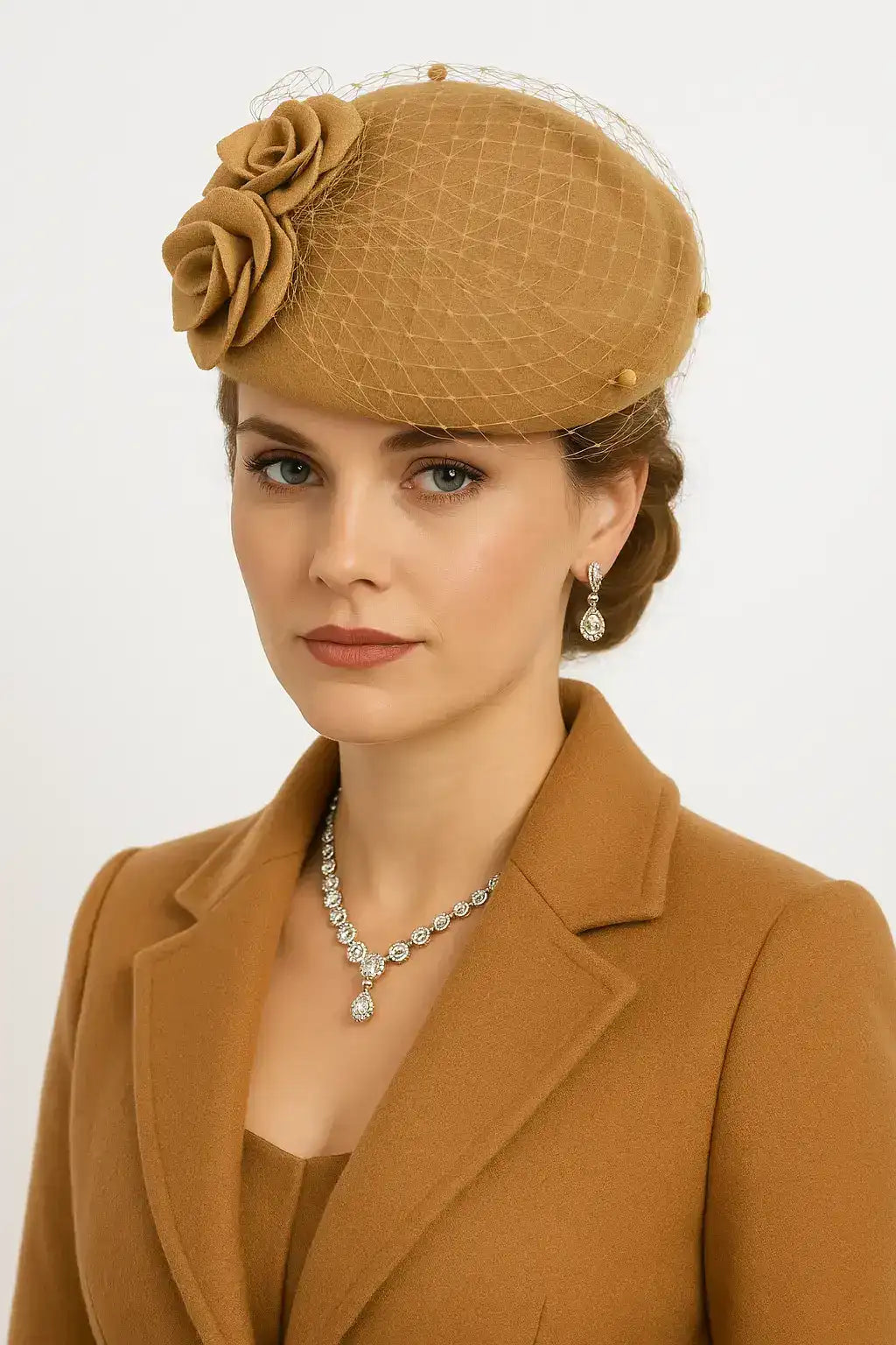 Woman styled in camel rose pillbox church hat with vintage veil