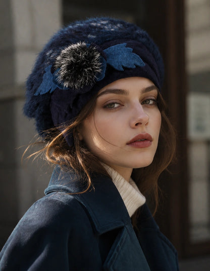 Navy blue angora wool beret with flower detail styled with winter coat
