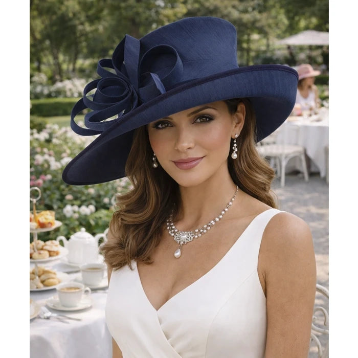 Stylish navy blue church hat for women with floral ribbon decoration, perfect for weddings and formal events