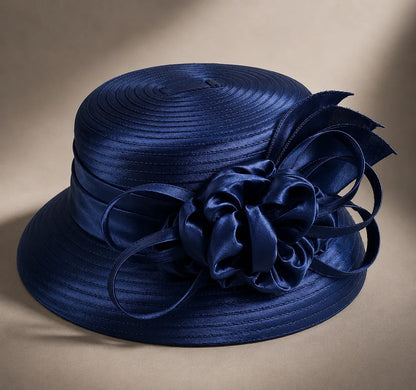 Flat lay of navy blue cloche short brim church hat with ribbon flower detail, elegant formal Sunday hat, FORBUSITE premium hat