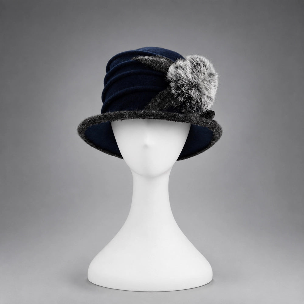 Navy blue women’s boiled wool cloche hat with contrasting brim and fuzzy pom