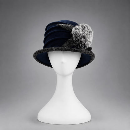 Navy blue women’s boiled wool cloche hat with contrasting brim and fuzzy pom