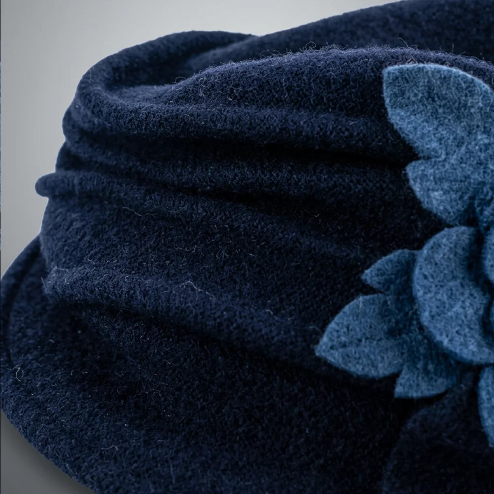 Close-up of the navy boiled wool felt surface and ruched crown