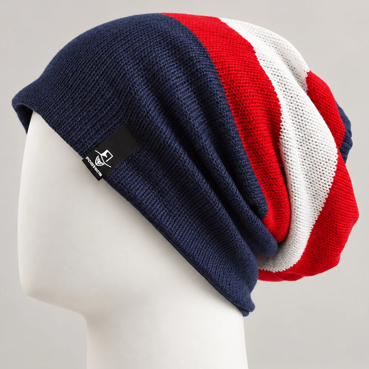 Navy red and white striped knit slouchy beanie with a relaxed long crown