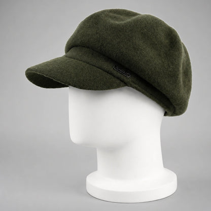 Olive green women’s wool newsboy cap with short visor on mannequin