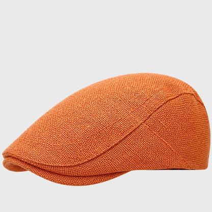 Bright orange flat cap with an Ivy cap design. Made from cotton, this driving cap adds a pop of color to any casual or semi-formal outfit, perfect for all seasons