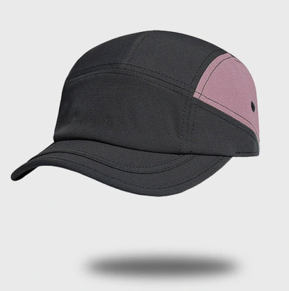 Outdoor UV protection cap in black, compact and lightweight, designed for outdoor sports and activities