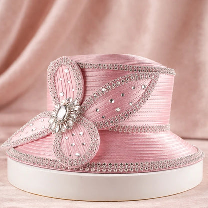 Pink church hat with an elegant floral design, perfect for weddings and high-end events, by FORBUSITE