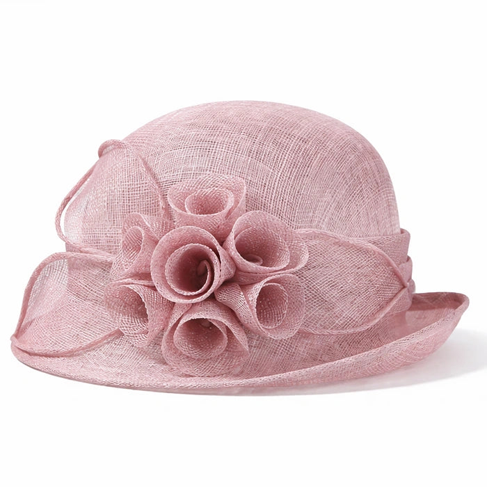Chic pink cloche sinamay hat adorned with flower accents, ideal for weddings, formal ceremonies, and garden parties.