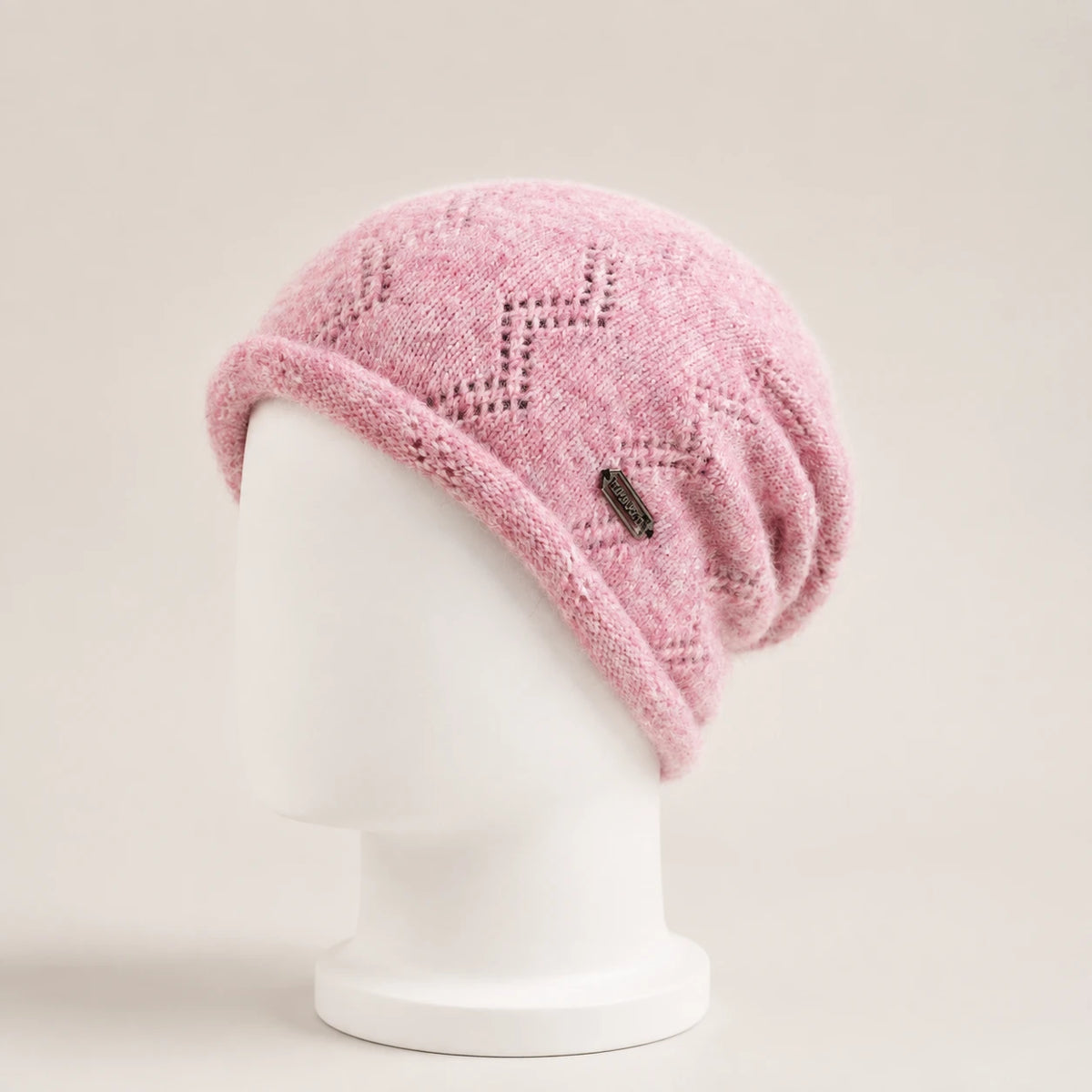 Pink diamond-knit slouchy beanie with a soft rolled edge