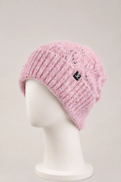 Pink fuzzy sequin cuffed beanie displayed on a matte white mannequin.