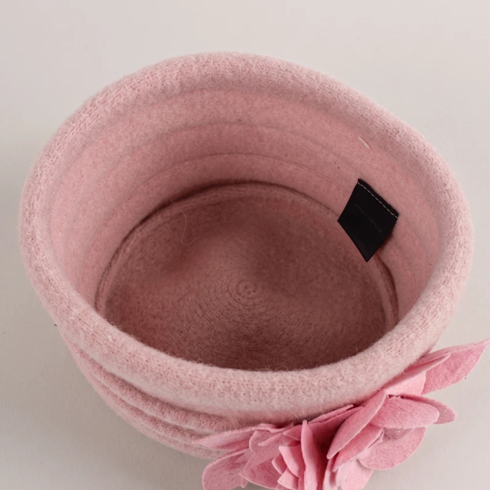 Interior view of an unlined pink boiled wool felt hat