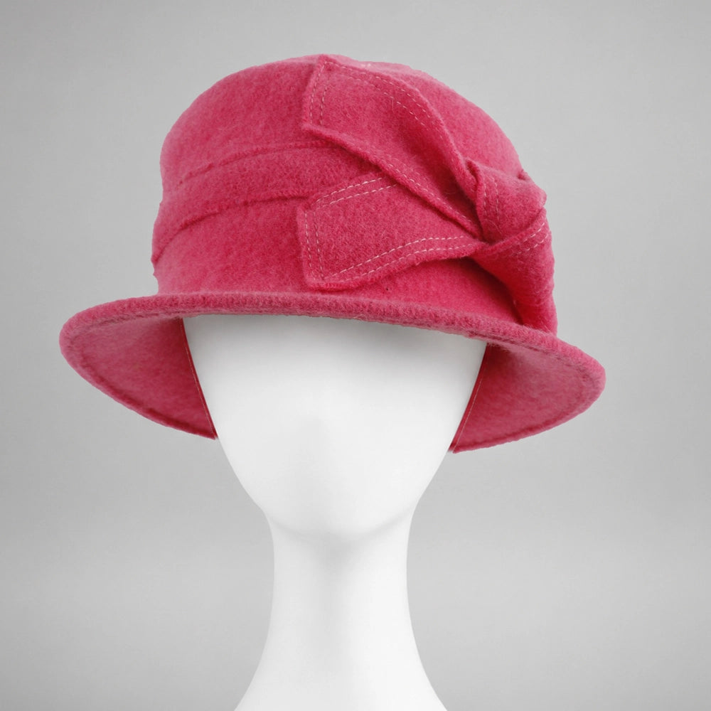 Pink women’s wool felt cloche hat with fixed side bow