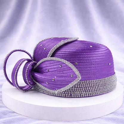 Elegant purple satin church hat with crystal embellishments, perfect for formal events.