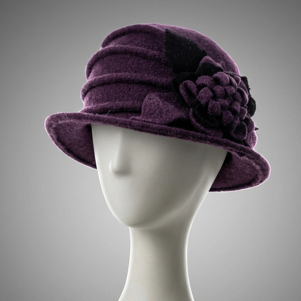 Purple wool felt cloche hat with a fixed tonal flower decoration