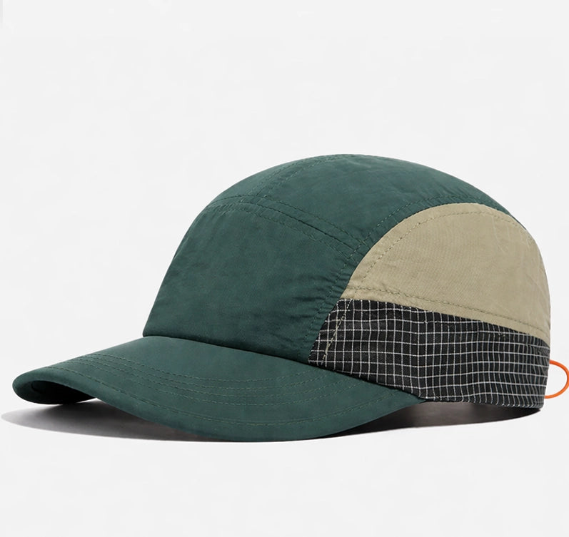 Lightweight camping cap with UV protection and quick-dry fabric, designed for long outdoor sessions in warm weather. Comfortable and functional.