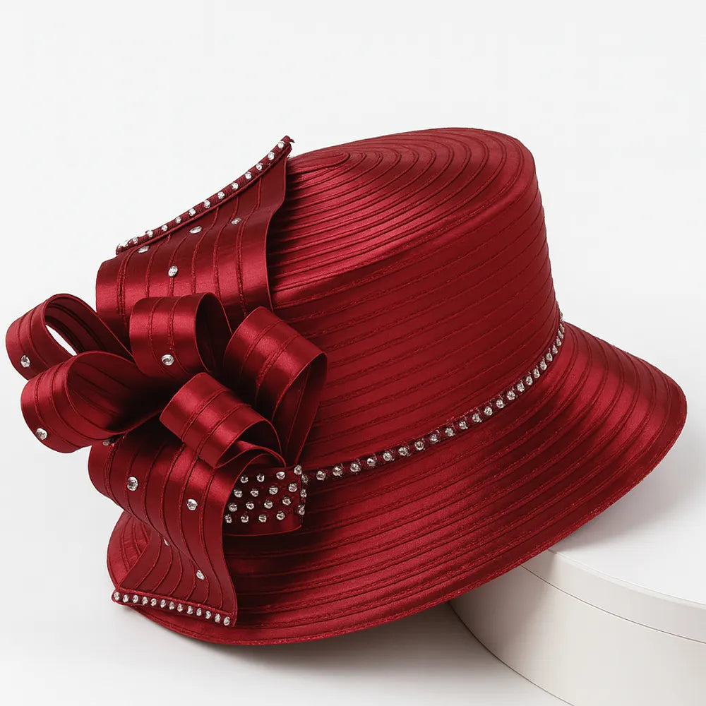 Elegant burgundy red church hat with rhinestone bow detail on white turntable, perfect for women’s Sunday service or formal events