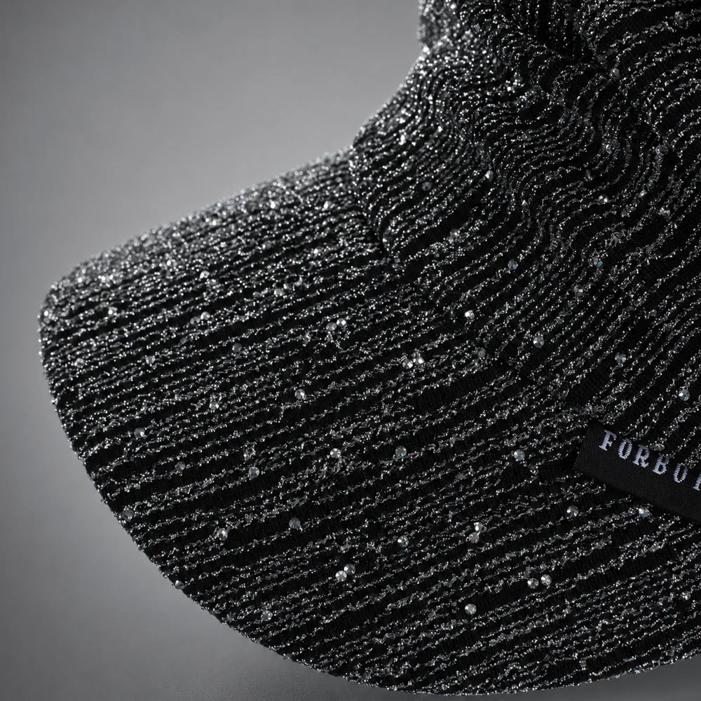 Close-up of 2.4 inch front visor and rhinestone detail on a women’s ruched visor cap