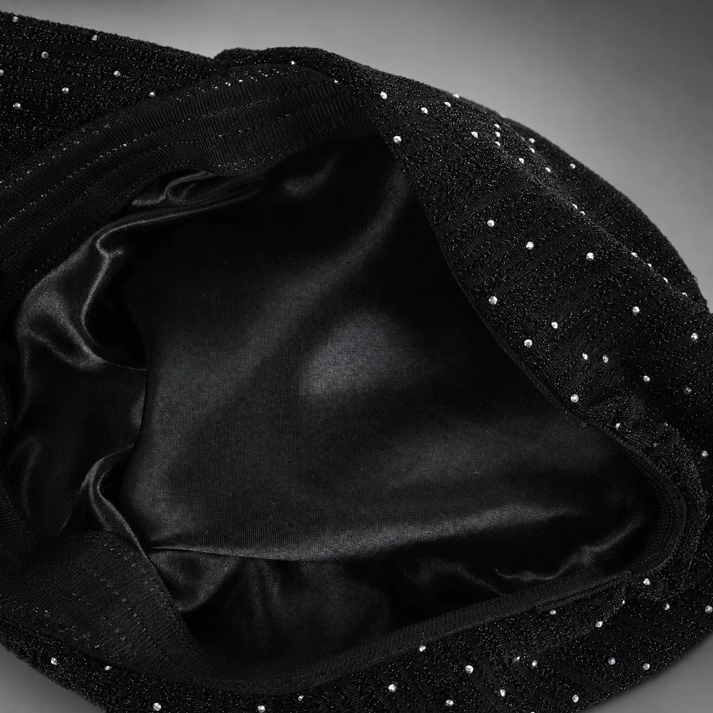 Interior of women’s ruched visor cap showing smooth black satin lining