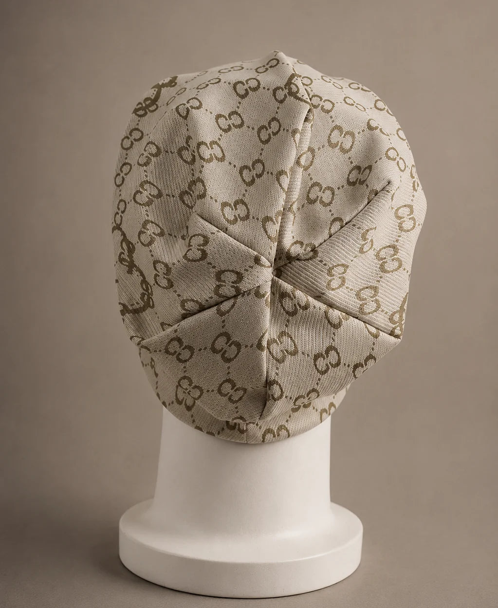 Front view of beige CC jacquard slouchy beanie hat, oversized baggy knit beanie cap, vintage style unisex beanie for all season wear