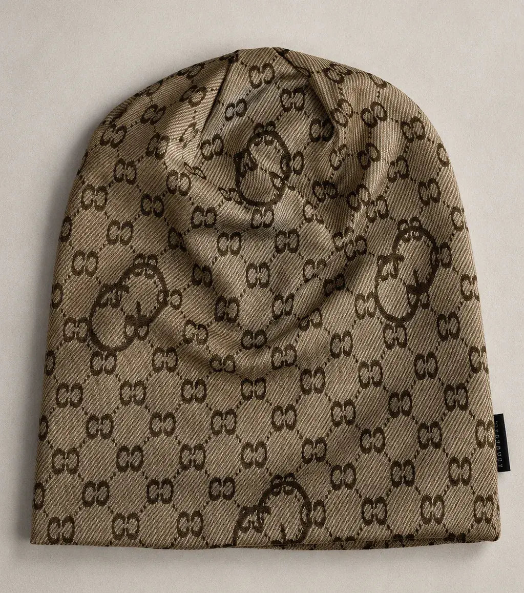 Close-up flat lay of slouchy beanie hat showing CC print jacquard fabric and texture details, perfect for men and women, oversized and baggy style.