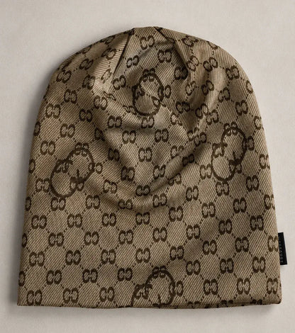 Close-up flat lay of slouchy beanie hat showing CC print jacquard fabric and texture details, perfect for men and women, oversized and baggy style.