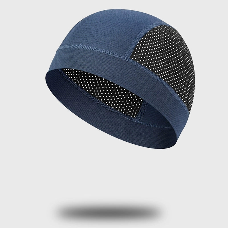 Blue sports beanie, ideal for winter activities, offering lightweight fabric with ventilation.