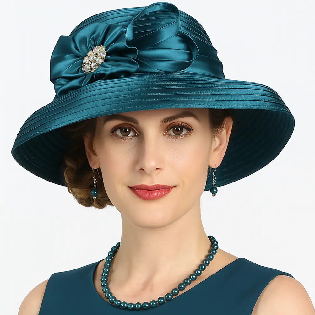 Deep teal satin church hat with matching pearls and flower for formal events