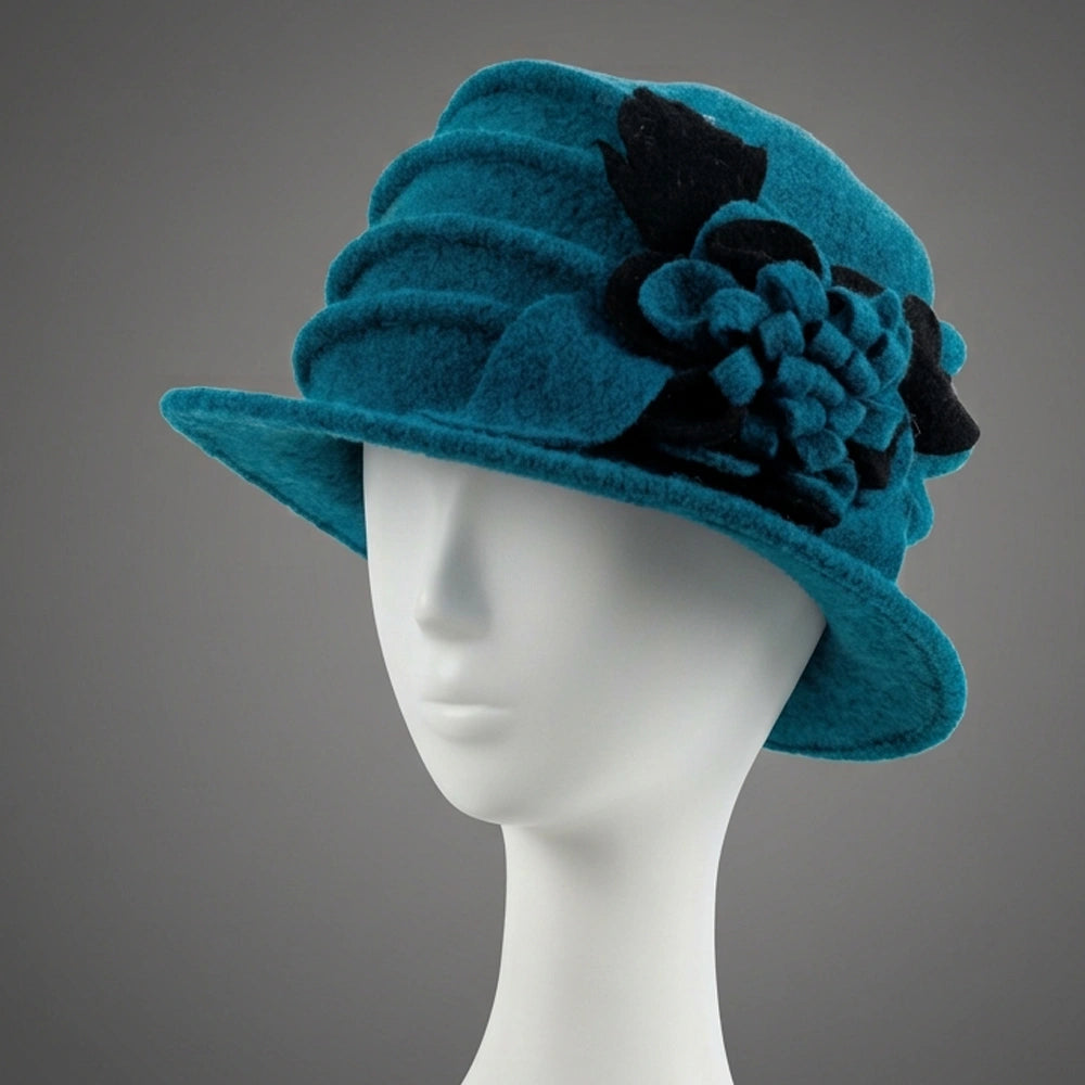 Teal wool felt cloche hat with black and teal floral side detail