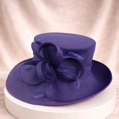 Top view of a purple hat with ribbon detail, perfect for wedding and garden party outfits.