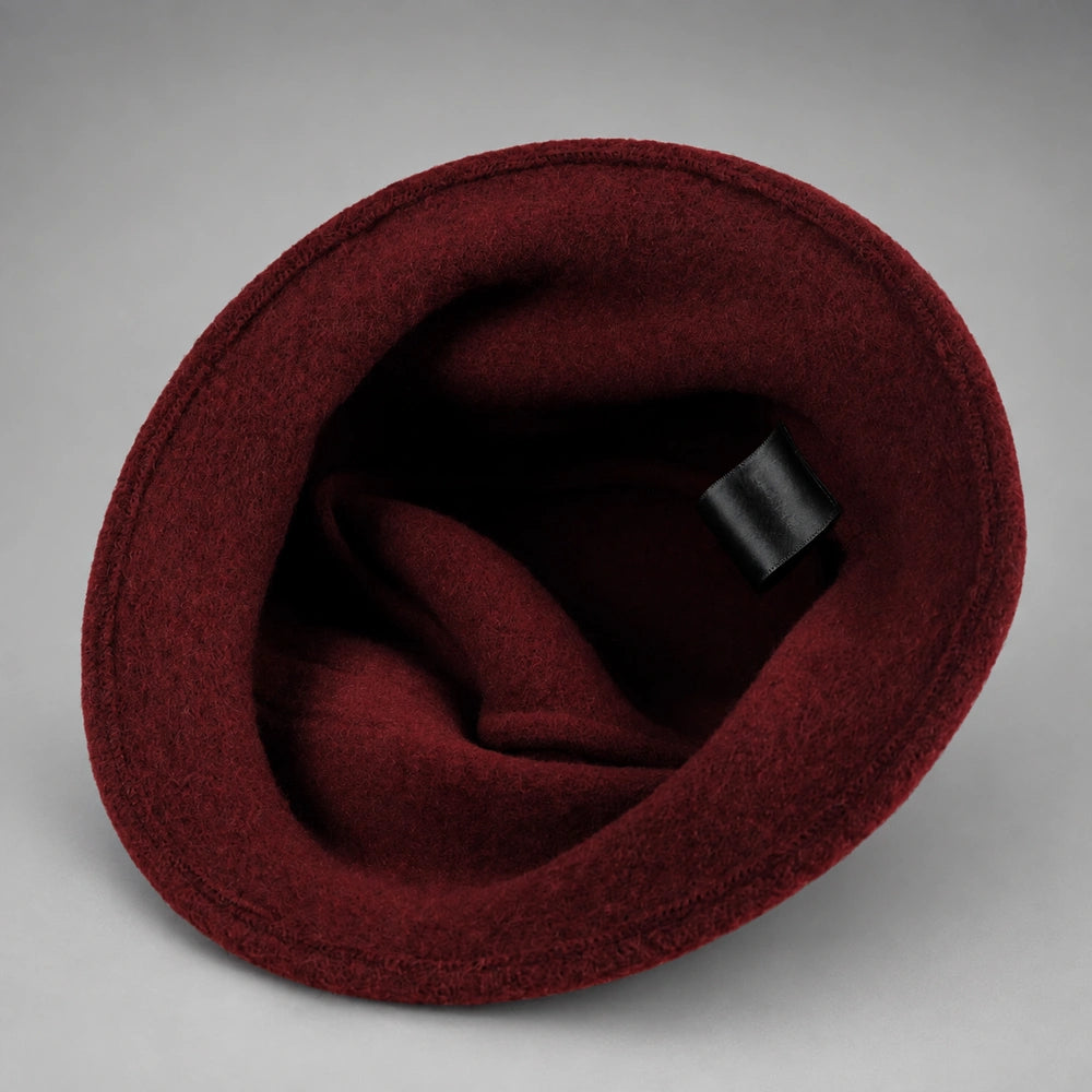 Interior view of an unlined wool felt cloche hat