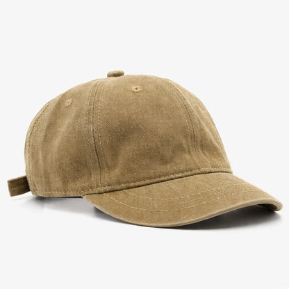 Washed denim cotton dad hat baseball cap, soft and breathable, distressed style for a relaxed look and perfect sun protection.