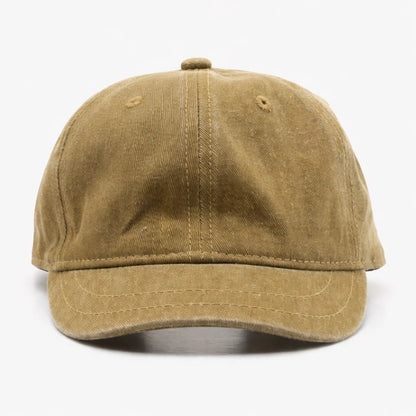 Washed khaki cotton dad hat baseball cap, distressed style with adjustable strap, perfect for a relaxed, casual look.
