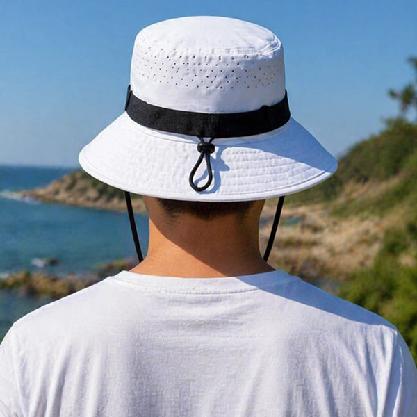 Perfect for hiking and fishing, this white bucket hat provides comfort and sun protection with adjustable straps.