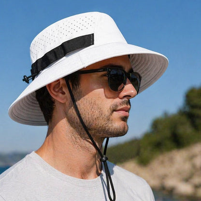 Stylish white bucket hat for men and women, ideal for outdoor activities like fishing and hiking, with a drawstring for a secure fit.