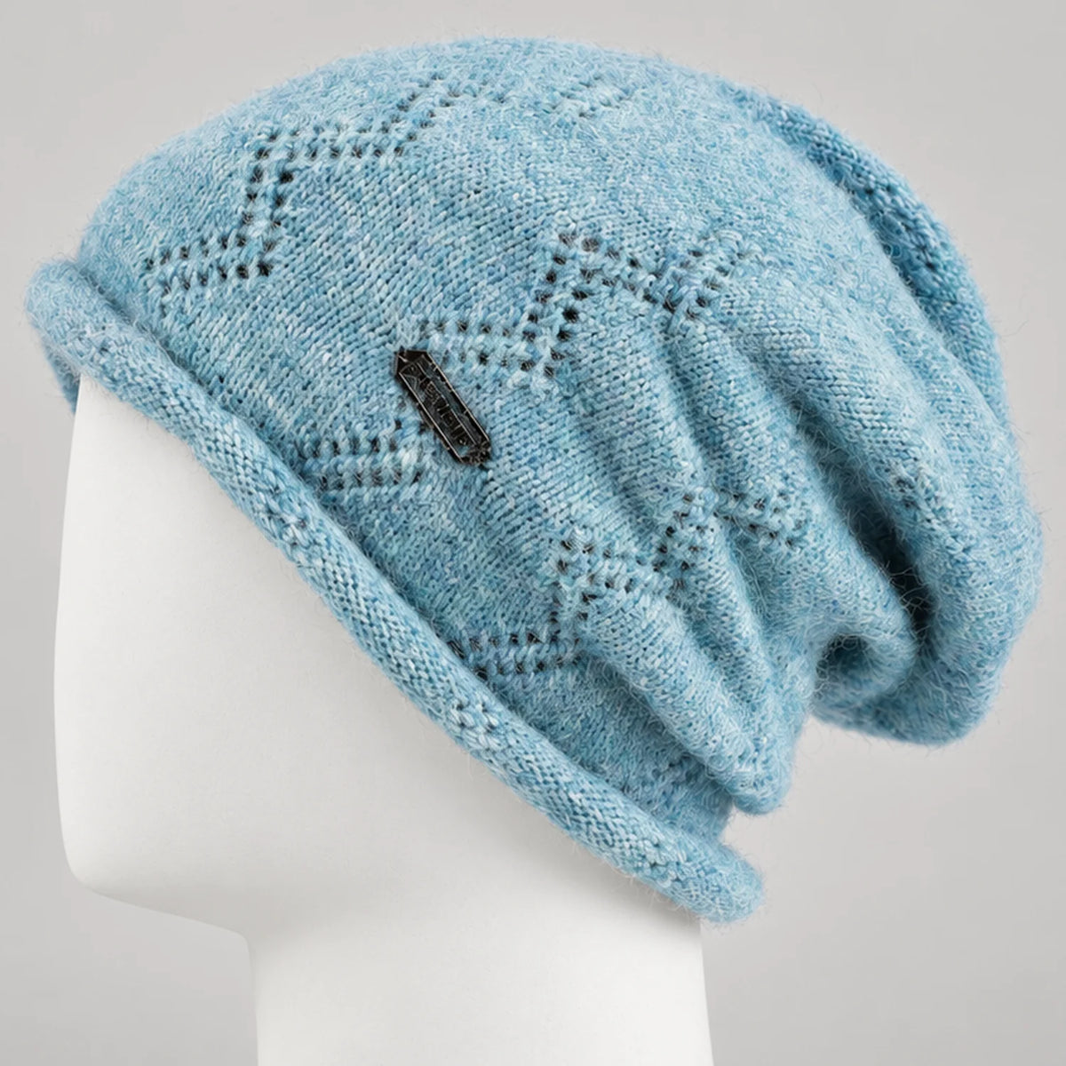 Women's soft winter slouchy beanie with a fuzzy textured crown and relaxed fit