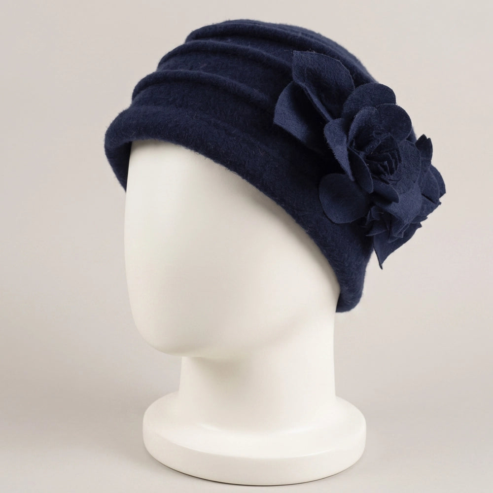 Navy women’s brimless boiled wool cloche hat with ruched crown and fixed floral detail
