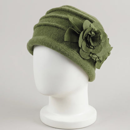 Olive green brimless boiled wool cloche hat with fixed floral decoration