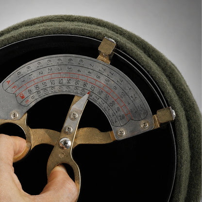 Adjustable sweatband inside wool newsboy cap measuring about 57 cm