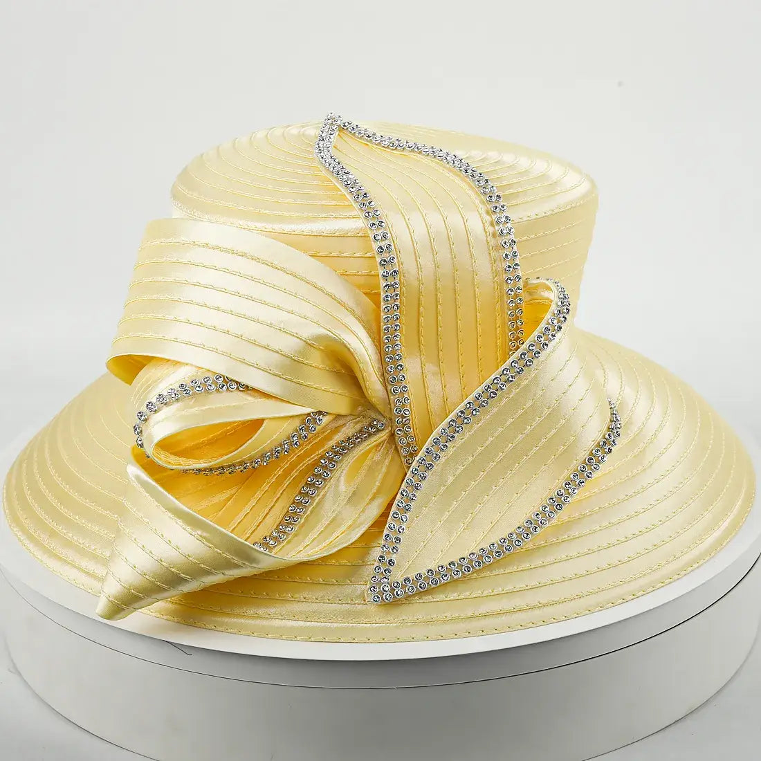 yellow wide-brim church hat with pleated satin texture and rhinestone ribbon bow, ideal for weddings and Sunday service